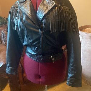 Women’s Black motorcycle, crossbody zipper. Zipped sleeves.